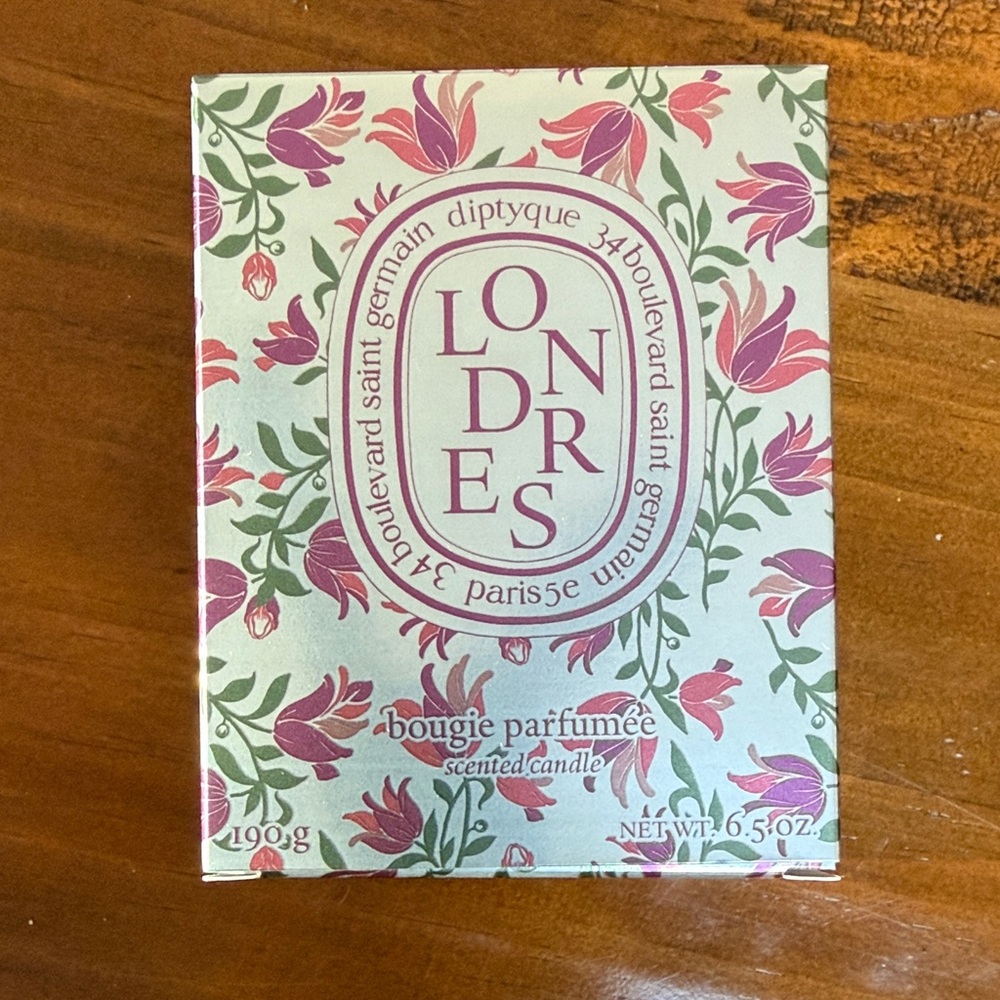 Diptyque Londres Candle with Silver and Purple Floral Design (6.5 oz).